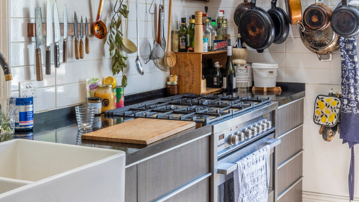 Kitchen counter with pans and knives