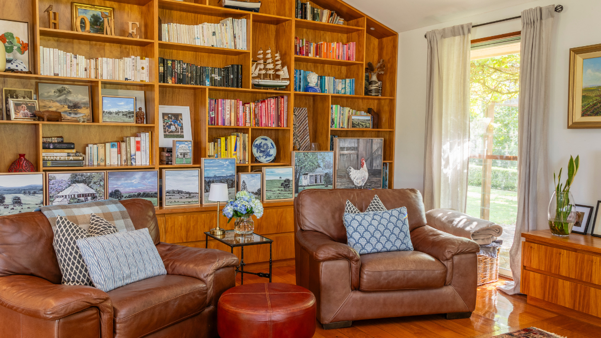 bookshelf and couches in a livingroom