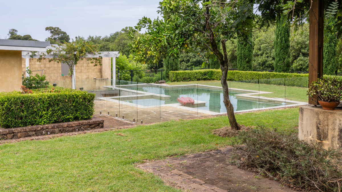 Pool in backyard of house